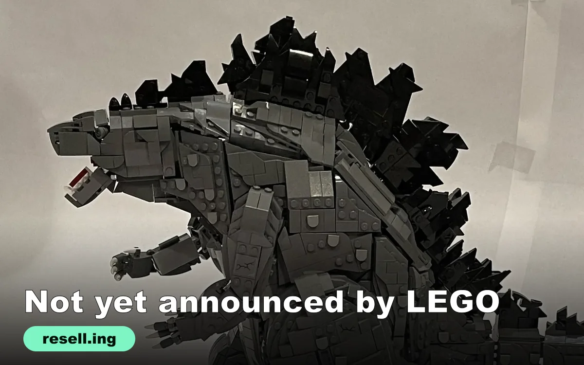Fan-built LEGO Godzilla model in dark gray bricks with black dorsal plates, shown in profile, with the resell.ing logo