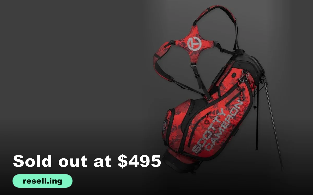 Red and black camo Scotty Cameron The Slasher Pathfinder stand bag with Circle T strap pad and silver Scotty Cameron lettering on a dark gray background
