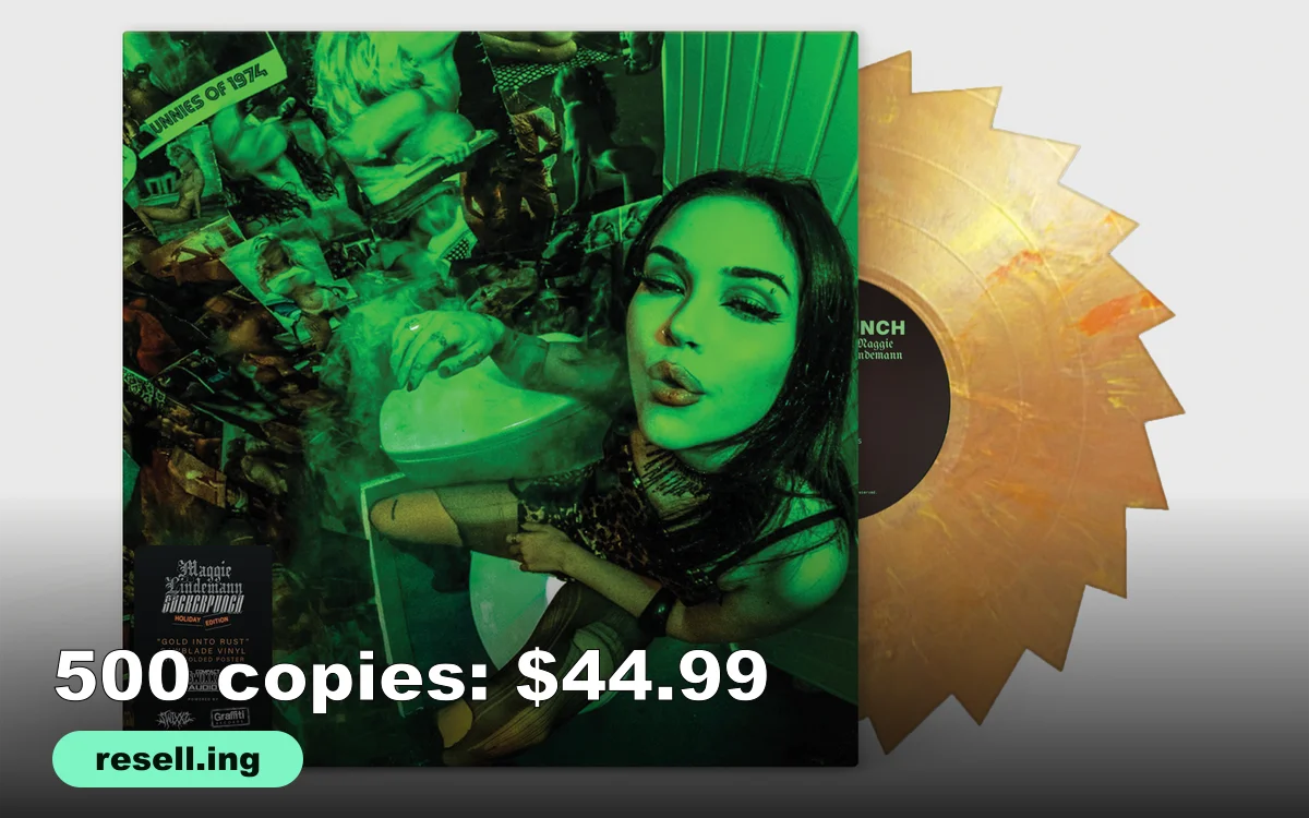 Maggie Lindemann Suckerpunch Holiday Edition LP in a green sleeve with a gold sawblade-shaped vinyl record sliding out