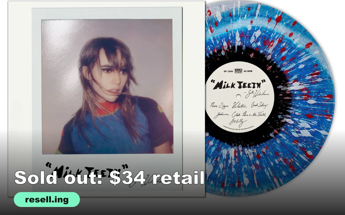 Suki Waterhouse Milk Teeth EP sleeve with a polaroid-style photo and a blue, black, white and red splatter vinyl record beside it
